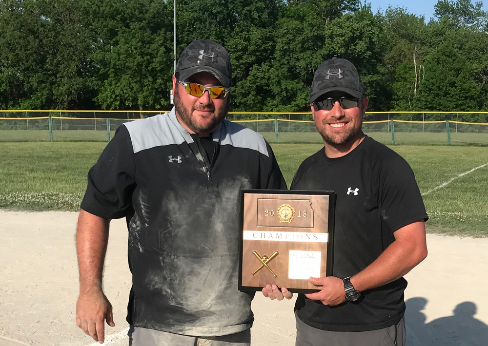 WolfDog Softball Coaches holding Regional Champion Plaque