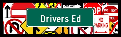 Driver Ed on green sign with traffic signs in the background