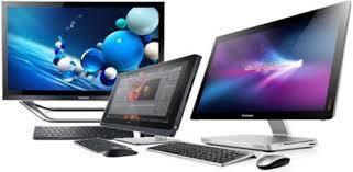 2 desktop computers, keyboards, and a laptop computer